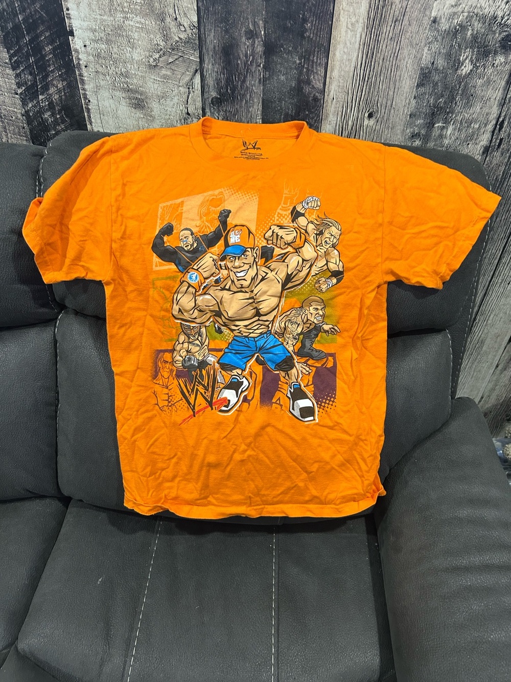 WWE kids’ cartoon shirt! Featuring Cena, Orton, Mysterio ect
